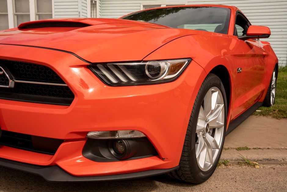 Shiny sports car exterior with flawless paint protection